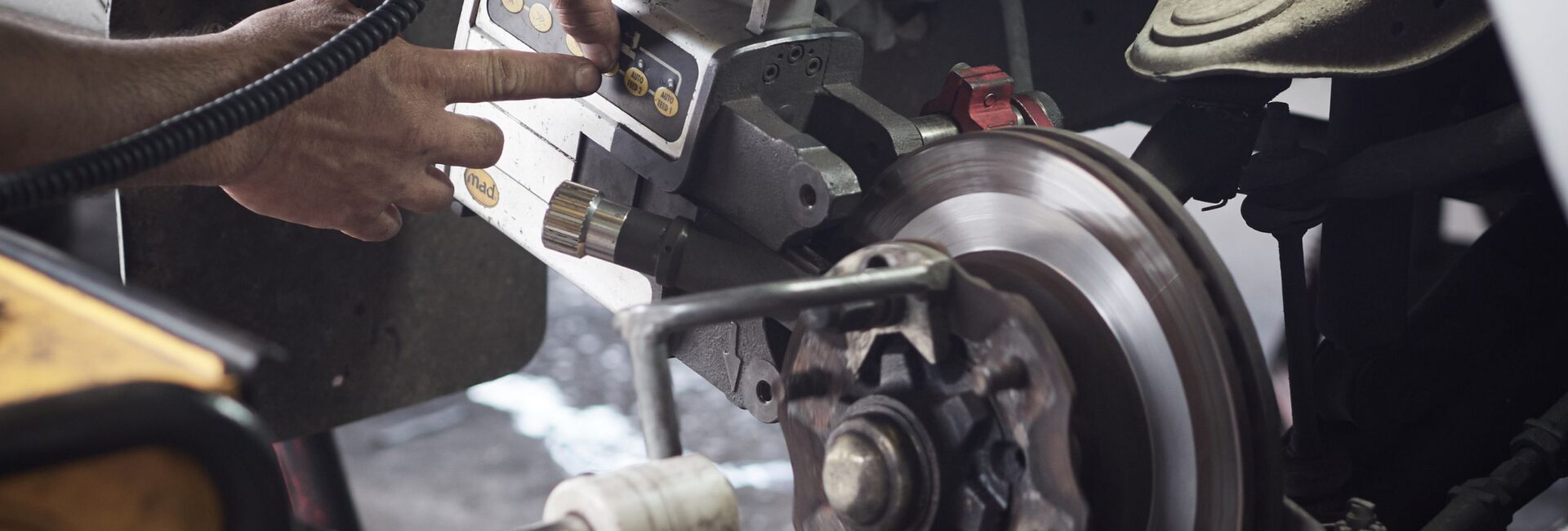 Person Working on Brakes