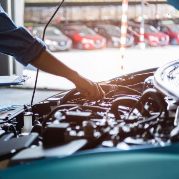 Person Working on Car